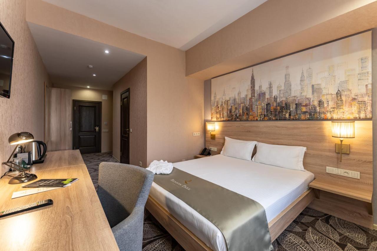 Renion Park Hotel อัลมาตี ภายนอก รูปภาพ