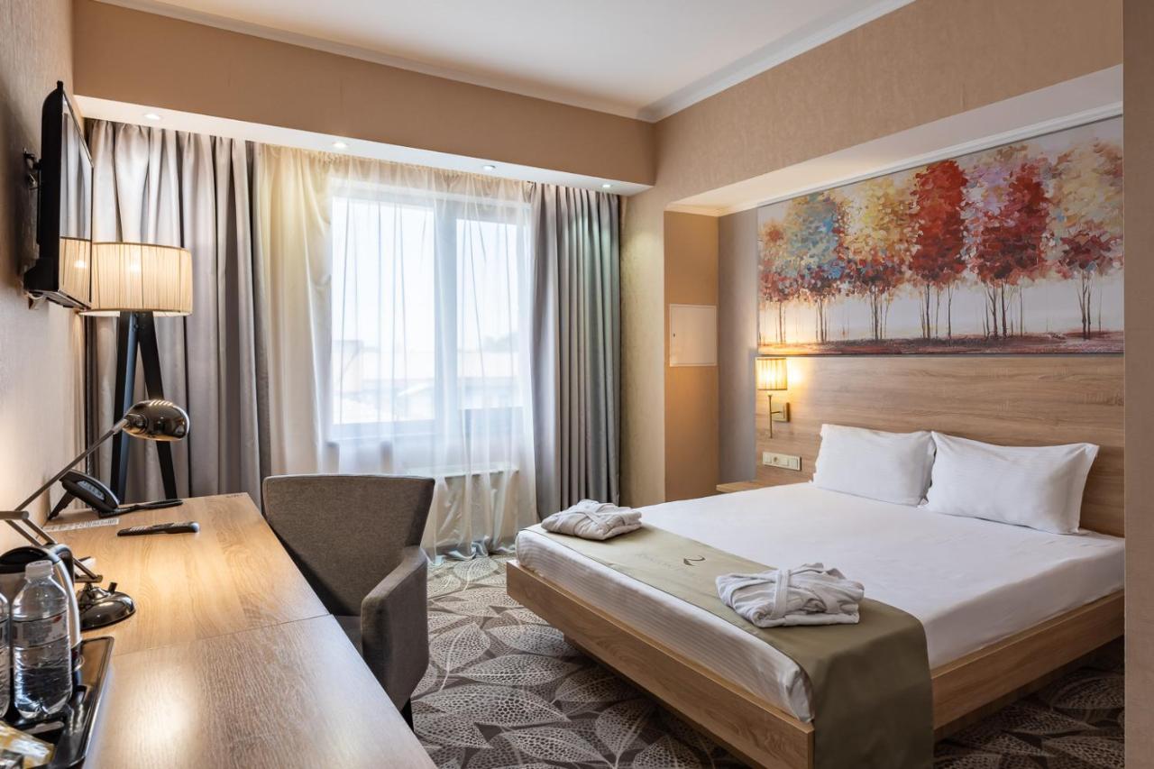 Renion Park Hotel อัลมาตี ภายนอก รูปภาพ
